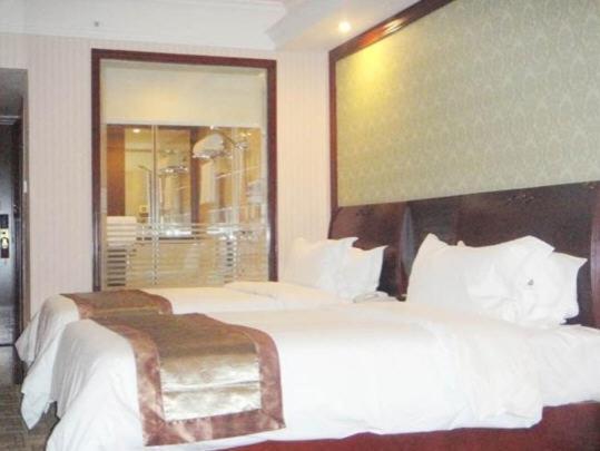 Vienna Hotel Chaoyang Nanning Quarto foto